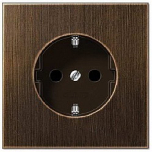 Розетка с заземлением без рамки Jung LS990 metal 1-м. античная латунь картинка